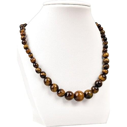Jewelry of all sizes is mixed with Transparent texture Amber Color Tiger eyes stone Necklace. A heavy PROM necklace