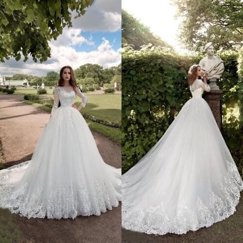 2020 Wedding Dresses O-Neck Long Sleeves Lace Appliques Bridal Gowns Button and Lace-up Back Sweep Train A Line Wedding Dress