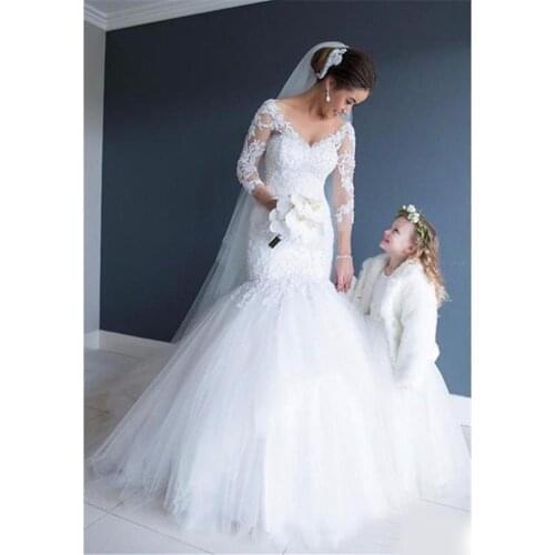 Sheer Long Sleeves Sexy V-Neck Backless Appliques Classic Fishtail Bridal Gowns New Romantic Lace Mermaid Wedding Dresses