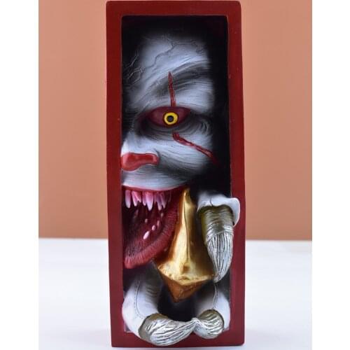 Monster ornaments and resin ornaments on the bookshelf