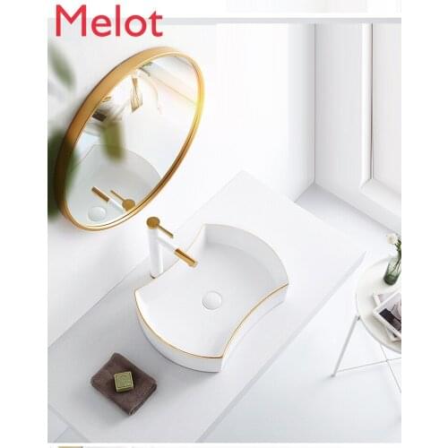 Modern simple Nordic gold stage basin toilet creative ceramic wash basin wash basin art basin wash basin
