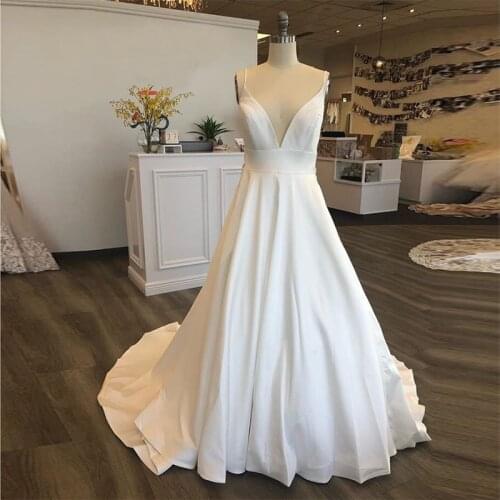Simple A-line Wedding Dresses V-neck Spaghetti Straps 2019 Backless Appliques Beading Vestido De Novia Chapel Train Bridal Gowns