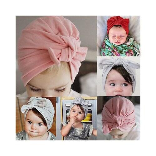 Lioraitiin Infant Newborn Baby Toddler Kid Boy Girl Hat Solid Color Bowknot Beanie Hat Cap Hair Accessories