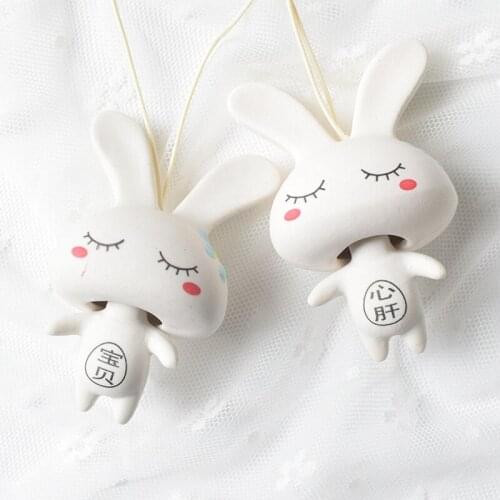Ceramic wind chime creative cartoon rabbit couple mobile phone pendant bag