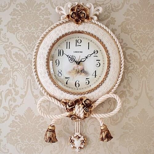 Watch the European creative living room wall clock wall clock quartz clock mute American Pastoral fashion personality retro big