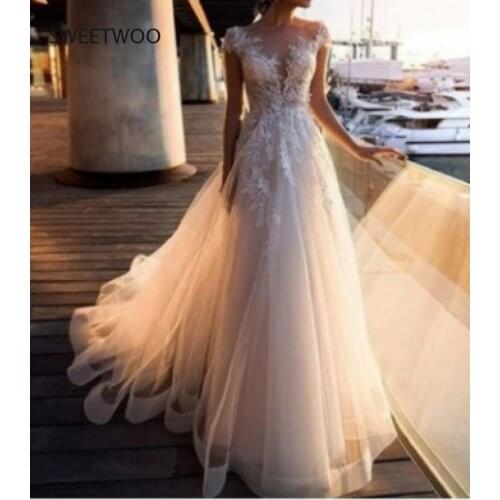 2021 Summer European and American Sexy Lace Perspective Dress Round Neck White Wedding Evening Dress Long Skirt New