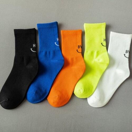 Autumn and winter new products fashion heel solid color smile socks ins tide cute cartoon tube socks women