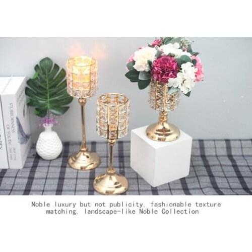 Romantic candlelight dinner aureate candlestick places a contemporary and contracted mensal feather adornment Europe type crysta