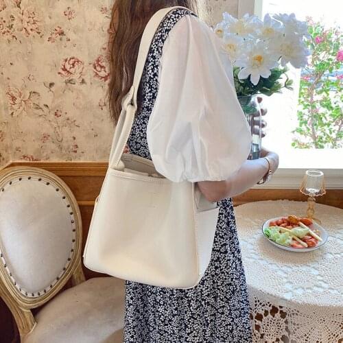 2021 new product niche designer style simple handbag single shoulder messenger bag soft waxy glutinous tote bag