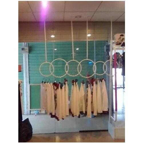 Clothes hangers on wall rings clothing store hanger reveal frame, wrought iron shelves, clothing store shelves