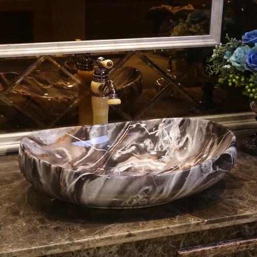 Oval Porcelain bathroom ceramic counter top sink wash basin popular in europe art basin antique wash sink