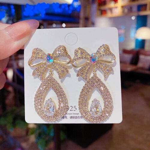 Trendy elegant handmade golden bow-knot water drop design AAA CZ hanging dangle earrings for women girl wedding costume jewelry