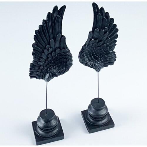 Polyester Sculpture angel wing figure right and left two figures black matte coloured dimensions of one piece 10cm x 36cm x 7cm