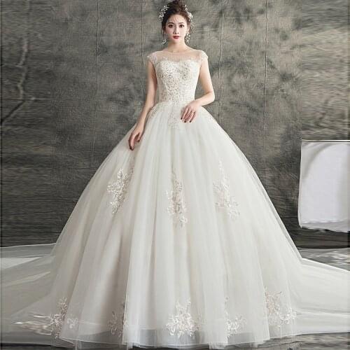 Wedding Dresses Illusion O-Neck Sleeveless Tulle Lace Sequined Beading Backless Train Luxury White Vintage Lady Bridal Gown G536