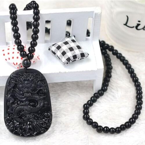 Natural obsidian crystal Buddha necklace is the necklace of the dragon big belly Buddha pendant and the necklace is sold well