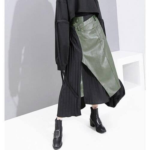 Fashion green elastic high waist asymmetric pleated half body temperament Skirt Woman tide new spring autumn 2020