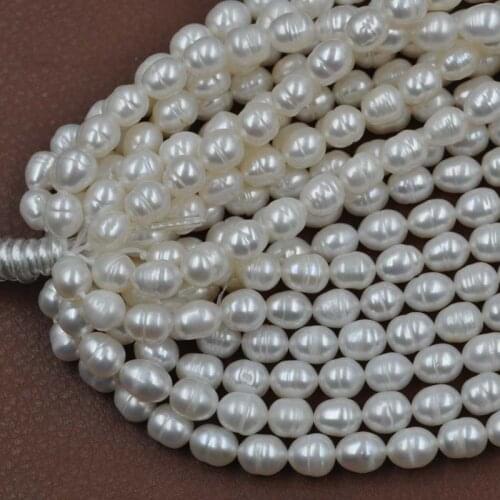 Wholesale 10 strands real rice freshwater pearl 6-6.5*7-9mm natural color