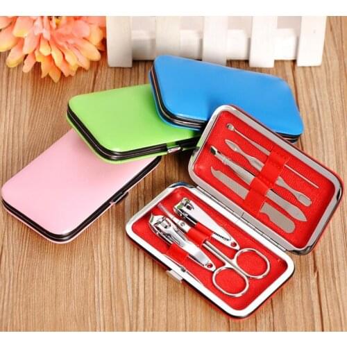 7pcs Nail Clippers Kit Scissors Tweezer Knife Ear pick Utility Manicure Set Tools Gifts Random Colors SN2332