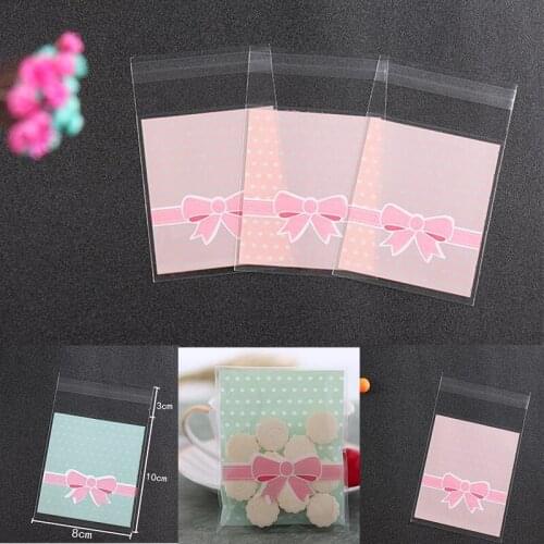 100pcs Bowknot Cellophane packaging bags Wedding Birthday Party Cookies Candy Gift Bags