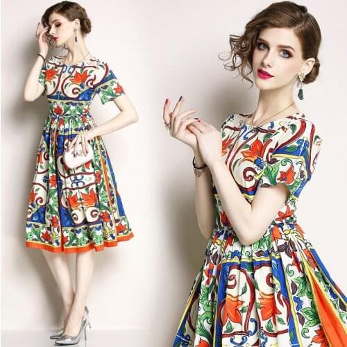 Summer new European and American womens temperament round neck Slim thin large pendulum printing short-sleeved dress explosion
