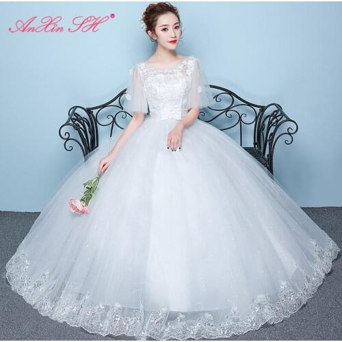 AXJFU princess flower bow white lace wedding dress party vintage o neck flare sleeve illusion ball gown lace up wedding dress