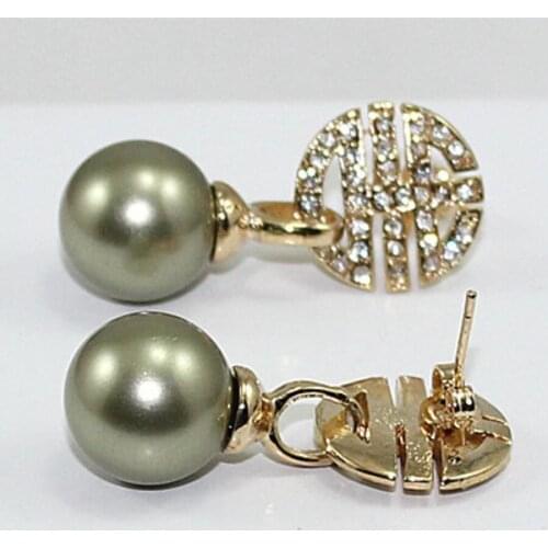 Womens fashion temperament gold plated light green shell pearl earrings