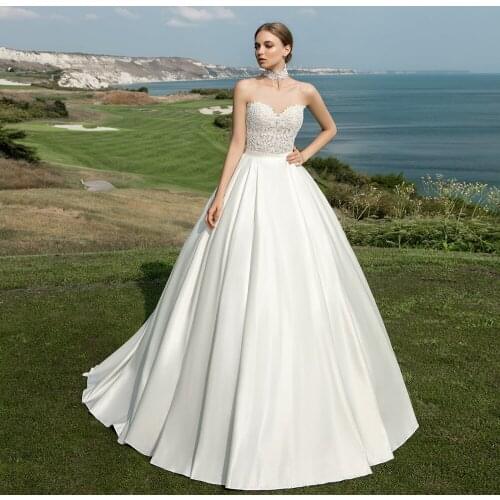 New Arrivals Best France Satin Wedding Dresses A-line Suknie Slubne Sweetheart Neck Backless Appliques See Through Gowns