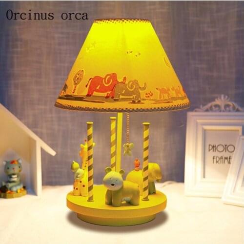 Cartoon creative merry go round table lamp boy girl bedroom childrens room lamp modern simple animal decorative table lamp