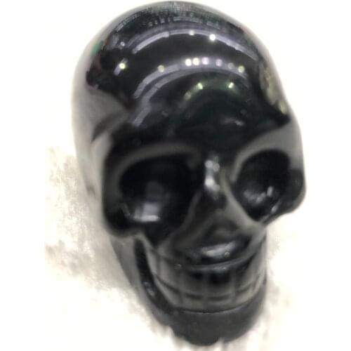 Beautiful natural obsidian hand-carved skull healing