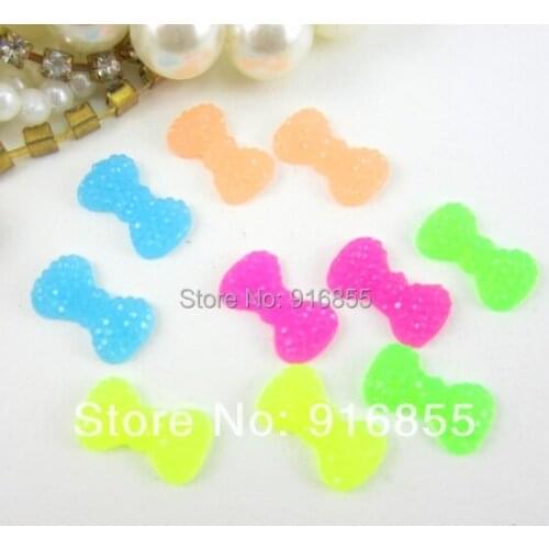 Free shipping new and fashion Jelly color 50pcs/lot 12.5*7mm bow shape flatback resin rhinestone for DIY (No Foiling)