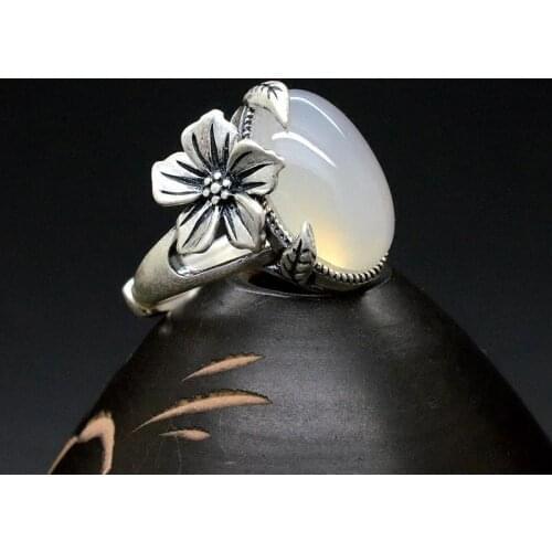 New silver original design plum blossom inlaid with natural jade pith female Chinese style light luxury cool breeze ring