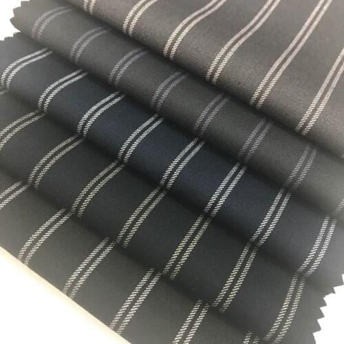 Factory Direct Tr Elastic Stripe Shuttle Fabric Uniform Fabric Vertical Stripe Spring and Autumn Fashion Suit Fabric Wholesale