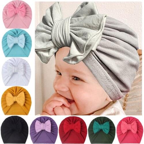 Hot New Good Quality Cute Bows Baby Girl Hat Turban Winter Autumn New Soft Elastic Nylon Newborn Toddler Hats