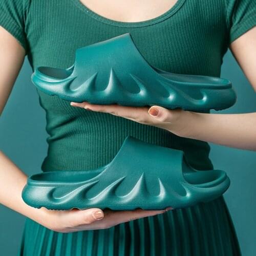 Flame slippers women wear thick-soled home bath slippers men and women ins house slippers mens shoes designer slippers