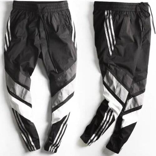 New Spring Summer Sports Pants Men Tooling Pants Male Beam Feet Male Youth Version Closing Feet Nine Points Pants Casual Pant