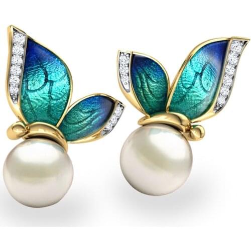 Ofertas Wholesale Bulk Hot Sale Luminous Butterfly Animal White Pearl Elegant Alloy Stud Earrings for Women