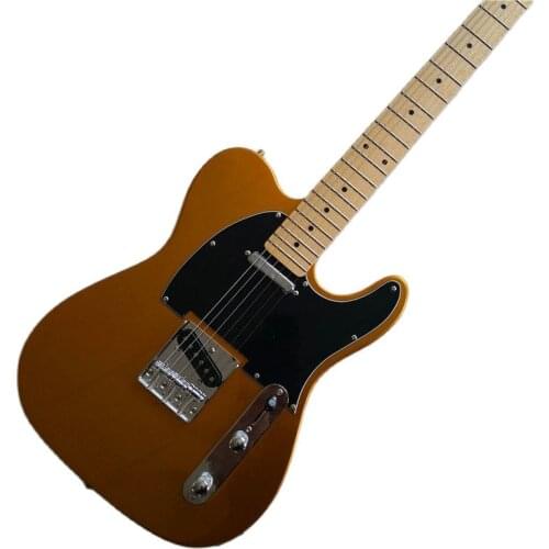 The factory customizes electric guitars of various colors and models