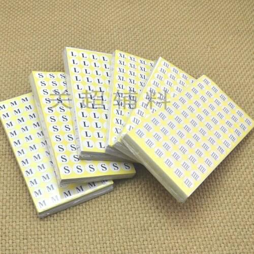 Circular sticker size standard white background with black text size label clothing scale code 1.4cm diameter size label