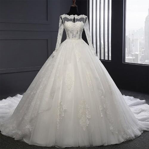 New Special Open Back Long Sleeve Sparkly Pearls Beading Sequined Appliques Lace Gorgeous Ball Gown Wedding Dresses Plus Size
