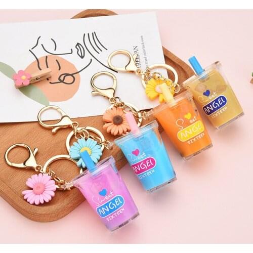 Fashion Moving Liquid Flower keychain Quicksand Pearl milk tea Bottle Keychains Women Couple bag Car keyring Pendant Gifts