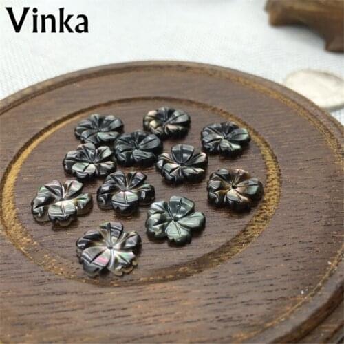 100PCS Factory Direct Black Butterfly Shell Size 28mm Carved Five Petals Flower Pendant Accessories