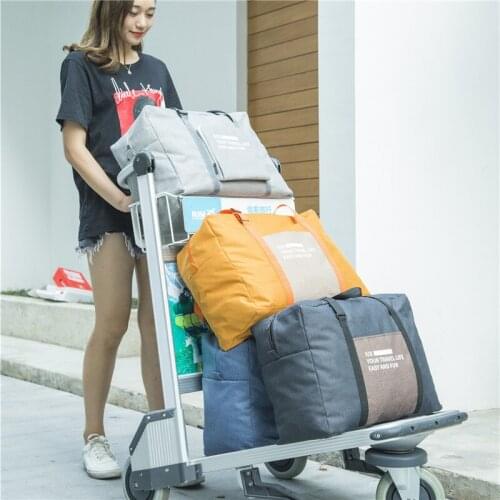 Waterproof travel storage bag folding portable clothes finishing bag trolley bag