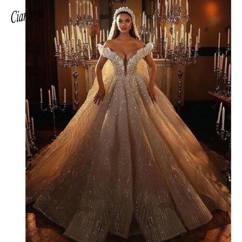 Sparkly Off The Shoulder Pearls Beading Dubai Ball Gown Wedding Dress Short Sleeve Crystal Tulle Pleat Arabic Bridal Gown