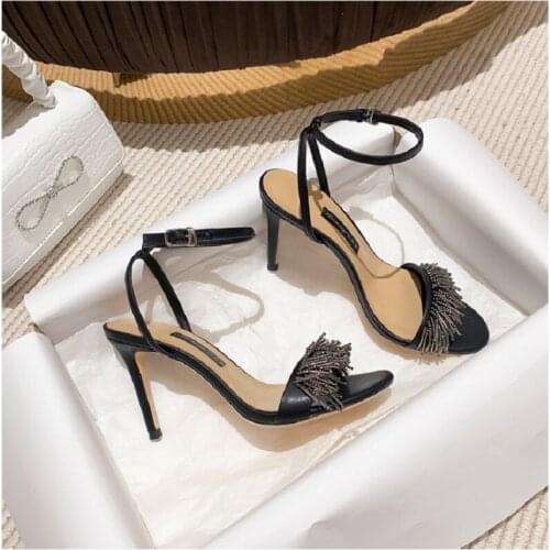 Summer new style silver stiletto buckle with tassel wild fashion bridal wedding shoes banquet dress wild small size female sanda