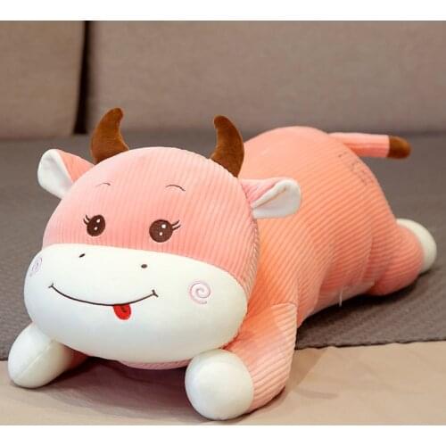 Cute bovine stuffed animal girl in bed doll holding sleeping niu Niu long pillow big doll