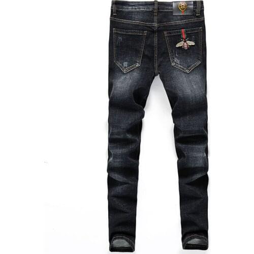 High-end 2021 autumn and winter new students slim mens small feet pants stretch dark blue denim teenagers long pencil pants