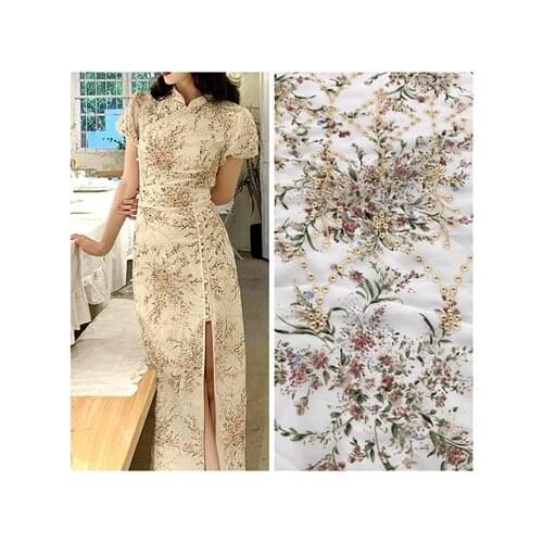 Summer white floral gold embroidery chiffon printed fabric improved cheongsam hollow doll diy clothing fabric