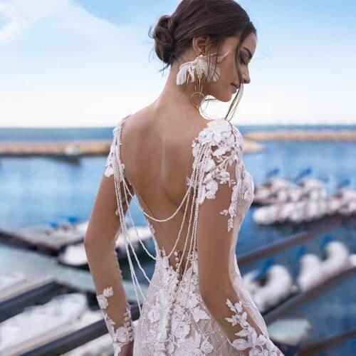Sexy Backless Lace Mermaid Wedding Dress 2021 Long Sleeve Bridal Beaded V-neck Bride Dresses African Wedding Gowns