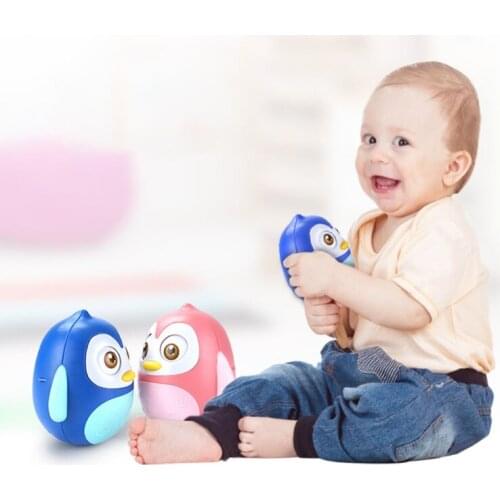 Plastic Winking Tumbler Toy Blue /Pink Music Wobbler Baby Toy Gravity Sensor Exercise Babys Perception Ability 1 Piece