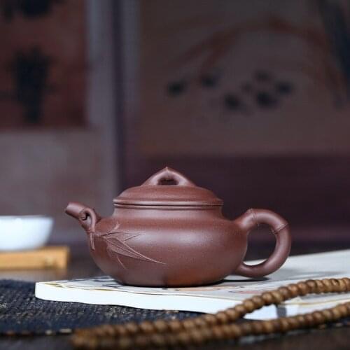 Yixing famous handmade undressed ore purple clay teapot bamboo antique teapot 200 ml of factory direct sale